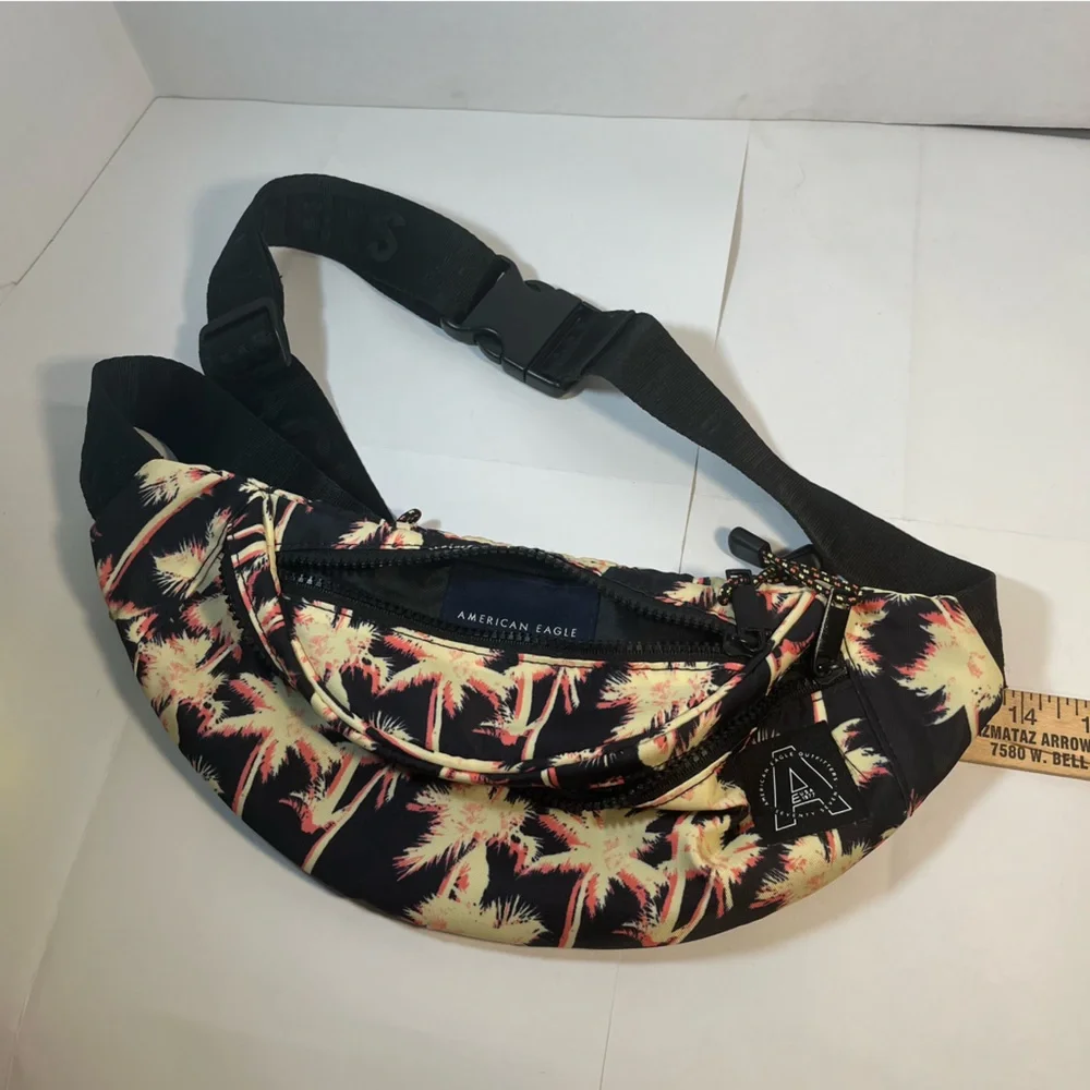American Eagle fanny pack Three zipper pockets, palm tree design